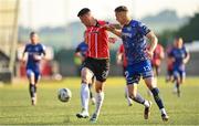 9 June 2023; Cian Kavanagh of Derry City in action against Kacper Radkowski of Bohemians during the SSE Airtricity Men's Premier Division match between Derry City and Bohemians at The Ryan McBride Brandywell Stadium in Derry. Photo by Seb Daly/Sportsfile