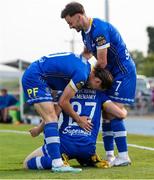 9 June 2023; Dean McMenamy of Waterford, centre, is congratulated by team-mates Conor Parsons, and Shane Griffin after his scored his sides first goal during the SSE Airtricity Men's First Division match between Waterford and Bray Wanderers at RSC in Waterford. Photo by Michael P Ryan/Sportsfile