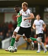 9 June 2023; Greg Sloggett of Dundalk in action against Tunde Owolabi of Cork City during the SSE Airtricity Men's Premier Division match between Cork City and Dundalk at Turner's Cross in Cork. Photo by Eóin Noonan/Sportsfile