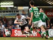 9 June 2023; Daniel Kelly of Dundalk is tackled by Ally Gilchrist of Cork City during the SSE Airtricity Men's Premier Division match between Cork City and Dundalk at Turner's Cross in Cork. Photo by Eóin Noonan/Sportsfile