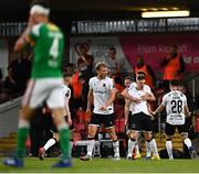 9 June 2023; John Martin of Dundalk celebrates with teammate Ryan O'Kane after scoring his side's second goal during the SSE Airtricity Men's Premier Division match between Cork City and Dundalk at Turner's Cross in Cork. Photo by Eóin Noonan/Sportsfile
