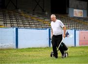 10 June 2023; Groundsman Jim Kennedy prepares the sideline flags before the 2023 All-Ireland U14 Bronze Final match between Clare and Wicklow at McDonagh Park in Nenagh, Tipperary. Photo by Michael P Ryan/Sportsfile