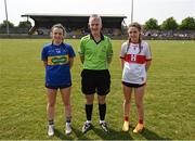 10 June 2023; Tipperary captain Neasa Dwan, referee Philip Conway, and Derry captain Aine Young before the 2023 All-Ireland U14 Gold Final between Derry and Tipperary at Clan na Gael GAA Club in Dundalk, Louth. Photo by Stephen Marken/Sportsfile