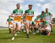 10 June 2023; Cian Farrell, left, and Aaron Brazil of Offaly break from the team photo before the Tailteann Cup Preliminary Quarter Final match between Offaly and Wexford at Glenisk O'Connor Park in Tullamore, Offaly. Photo by Tom Beary/Sportsfile