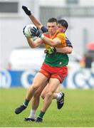 10 June 2023; Mikey Bambrick of Carlow in action against Liam Kearney of New York during the Tailteann Cup Preliminary Quarter Final match between Carlow and New York at Netwatch Cullen Park in Carlow. Photo by Matt Browne/Sportsfile