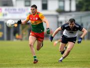 10 June 2023; Jordan Morrissey of Carlow in action against Robert Wharton of New York during the Tailteann Cup Preliminary Quarter Final match between Carlow and New York at Netwatch Cullen Park in Carlow. Photo by Matt Browne/Sportsfile