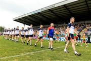 10 June 2023; New York captain Johnny Glynn leads his team-mates during the parade before the Tailteann Cup Preliminary Quarter Final match between Carlow and New York at Netwatch Cullen Park in Carlow. Photo by Matt Browne/Sportsfile