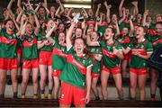 10 June 2023; Mayo captain Siofra McGuiness lifts the trophy after the 2023 All-Ireland U14 Platinum Final match between Cork and Mayo at McDonagh Park in Nenagh, Tipperary. Photo by Michael P Ryan/Sportsfile