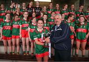 10 June 2023; Mayo captain Siofra McGuiness receives the trophy from Robbie Smyth, Munster LFGA President following the 2023 All-Ireland U14 Platinum Final match between Cork and Mayo at McDonagh Park in Nenagh, Tipperary. Photo by Michael P Ryan/Sportsfile