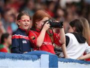 10 June 2023; A Cork supporter takes pictures during the 2023 All-Ireland U14 Platinum Final match between Cork and Mayo at McDonagh Park in Nenagh, Tipperary. Photo by Michael P Ryan/Sportsfile