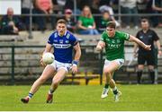 10 June 2023; Evan O’Carroll of Laois in action against Ronan McCaffrey of Fermanagh during the Tailteann Cup Preliminary Quarter Final match between Fermanagh and Laois at Brewster Park in Enniskillen, Fermanagh. Photo by David Fitzgerald/Sportsfile