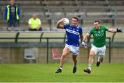 10 June 2023; Padraig Kirwan of Laois in action against Declan McCusker of Fermanagh during the Tailteann Cup Preliminary Quarter Final match between Fermanagh and Laois at Brewster Park in Enniskillen, Fermanagh. Photo by David Fitzgerald/Sportsfile