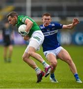 10 June 2023; Declan McCusker of Fermanagh in action against Colm Murphy of Laois during the Tailteann Cup Preliminary Quarter Final match between Fermanagh and Laois at Brewster Park in Enniskillen, Fermanagh. Photo by David Fitzgerald/Sportsfile