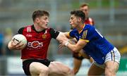 10 June 2023; Odhran Murdock of Down in action against Joe Hagan of Longford during the Tailteann Cup Preliminary Quarter Final match between Down and Longford at Pairc Esler in Newry, Down. Photo by Daire Brennan/Sportsfile