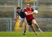 10 June 2023; Liam Kerr of Down in action against Bryan Masterson of Longford during the Tailteann Cup Preliminary Quarter Final match between Down and Longford at Pairc Esler in Newry, Down. Photo by Daire Brennan/Sportsfile