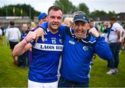 10 June 2023; Eoin Lowry of Laois is congratulated by by his father John after the Tailteann Cup Preliminary Quarter Final match between Fermanagh and Laois at Brewster Park in Enniskillen, Fermanagh. Photo by David Fitzgerald/Sportsfile