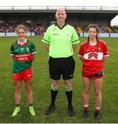 10 June 2023; Referee Paul McCaughey with Mayo captain Siofra McGuiness, left, and Cork captain Maeve Buckley before the 2023 All-Ireland U14 Platinum Final match between Cork and Mayo at McDonagh Park in Nenagh, Tipperary. Photo by Michael P Ryan/Sportsfile