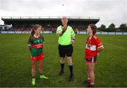 10 June 2023; Referee Paul McCaughey performs the coin toss before the 2023 All-Ireland U14 Platinum Final match between Cork and Mayo at McDonagh Park in Nenagh, Tipperary. Photo by Michael P Ryan/Sportsfile