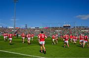 28 May 2023; Members of the Cork squad go to their pre game positions after the traditional pre match team photograph before the Munster GAA Hurling Senior Championship Round 5 match between Limerick and Cork at TUS Gaelic Grounds in Limerick. Photo by Ray McManus/Sportsfile
