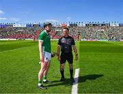 28 May 2023; Referee James Owens with Limerick captain Declan Hannon before the Munster GAA Hurling Senior Championship Round 5 match between Limerick and Cork at TUS Gaelic Grounds in Limerick. Photo by Ray McManus/Sportsfile