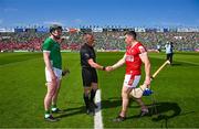 28 May 2023; Referee James Owens with the Cork, Sean O'Donoghue, and Limerick captain, Declan Hannon, before the Munster GAA Hurling Senior Championship Round 5 match between Limerick and Cork at TUS Gaelic Grounds in Limerick. Photo by Ray McManus/Sportsfile