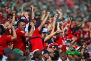 28 May 2023; Cork supporters celebrate a score during the Munster GAA Hurling Senior Championship Round 5 match between Limerick and Cork at TUS Gaelic Grounds in Limerick. Photo by Ray McManus/Sportsfile
