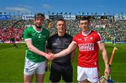 28 May 2023; Referee James Owens with the Cork, Sean O'Donoghue, and Limerick captain, Declan Hannon, before the Munster GAA Hurling Senior Championship Round 5 match between Limerick and Cork at TUS Gaelic Grounds in Limerick. Photo by Ray McManus/Sportsfile