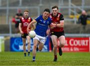 10 June 2023; Aaron Farrell of Longford in action against Odhran Murdock of Down during the Tailteann Cup Preliminary Quarter Final match between Down and Longford at Pairc Esler in Newry, Down. Photo by Daire Brennan/Sportsfile