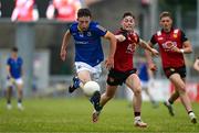 10 June 2023; Aaron Farrell of Longford in action against Ceilum Doherty of Down during the Tailteann Cup Preliminary Quarter Final match between Down and Longford at Pairc Esler in Newry, Down. Photo by Daire Brennan/Sportsfile