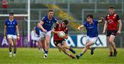 10 June 2023; Eugene Branagan of Down in action against Ryan Moffett, left, and Aaron Farrell of Longford during the Tailteann Cup Preliminary Quarter Final match between Down and Longford at Pairc Esler in Newry, Down. Photo by Daire Brennan/Sportsfile