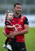 10 June 2023; Gerard Collins of Down with his daughter Saorlaith, aged 2, after the Tailteann Cup Preliminary Quarter Final match between Down and Longford at Pairc Esler in Newry, Down. Photo by Daire Brennan/Sportsfile