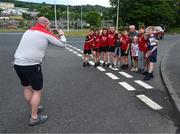 10 June 2023; Former Down manager and current selector Pete McGrath gets his photo taken with supporters after the Tailteann Cup Preliminary Quarter Final match between Down and Longford at Pairc Esler in Newry, Down. Photo by Daire Brennan/Sportsfile