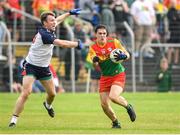 10 June 2023; Jonah Dunne of Carlow in action against Luke Kelly of New York during the Tailteann Cup Preliminary Quarter Final match between Carlow and New York at Netwatch Cullen Park in Carlow. Photo by Matt Browne/Sportsfile