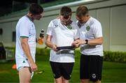 10 June 2023; Darragh Lenihan, left, with Andrew Morrissey, STATSports analyst, and Damien Doyle, head of athletic performance, right, during a Republic of Ireland training match at Calista Sports Centre in Antalya, Turkey. Photo by Stephen McCarthy/Sportsfile