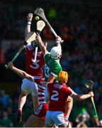 28 May 2023; A general view of hurling featuring Cork players Damien Cahalane, 3, Patrick Collins, the Cork goalkeeper and corner back, Niall O'Leary, in action against Limerick's Aaron Gillane during the Munster GAA Hurling Senior Championship Round 5 match between Limerick and Cork at TUS Gaelic Grounds in Limerick. Photo by Ray McManus/Sportsfile