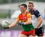 10 June 2023; Mikey Bambrick of Carlow in action against Johnny Glynn of New York during the Tailteann Cup Preliminary Quarter Final match between Carlow and New York at Netwatch Cullen Park in Carlow. Photo by Matt Browne/Sportsfile