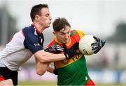 10 June 2023; Conor Crowley of Carlow in action against Alan Campbell of New York during the Tailteann Cup Preliminary Quarter Final match between Carlow and New York at Netwatch Cullen Park in Carlow. Photo by Matt Browne/Sportsfile