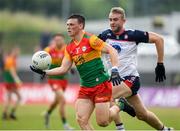 10 June 2023; Mikey Bambrick of Carlow in action against Johnny Glynn of New York during the Tailteann Cup Preliminary Quarter Final match between Carlow and New York at Netwatch Cullen Park in Carlow. Photo by Matt Browne/Sportsfile