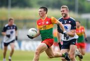 10 June 2023; Mikey Bambrick of Carlow in action against Johnny Glynn of New York during the Tailteann Cup Preliminary Quarter Final match between Carlow and New York at Netwatch Cullen Park in Carlow. Photo by Matt Browne/Sportsfile