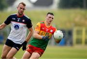 10 June 2023; Mikey Bambrick of Carlow in action against Johnny Glynn of New York during the Tailteann Cup Preliminary Quarter Final match between Carlow and New York at Netwatch Cullen Park in Carlow. Photo by Matt Browne/Sportsfile