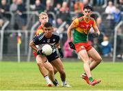 10 June 2023; Daniel O'Sullivan of New York in action against Ross Dunphy and Niall Hickey of Carlow during the Tailteann Cup Preliminary Quarter Final match between Carlow and New York at Netwatch Cullen Park in Carlow. Photo by Matt Browne/Sportsfile