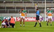 10 June 2023; Referee David Murnane shows a yellow card to Joe Maher of Offaly during the Tailteann Cup Preliminary Quarter Final match between Offaly and Wexford at Glenisk O'Connor Park in Tullamore, Offaly. Photo by Tom Beary/Sportsfile