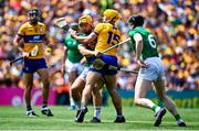 11 June 2023; Mark Rodgers of Clare is tackled by Tom Morrissey of Limerick during the Munster GAA Hurling Championship Final match between Clare and Limerick at TUS Gaelic Grounds in Limerick. Photo by Eóin Noonan/Sportsfile