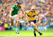 11 June 2023; Ryan Taylor of Clare in action against Gearoid Hegarty of Limerick during the Munster GAA Hurling Championship Final match between Clare and Limerick at TUS Gaelic Grounds in Limerick. Photo by Eóin Noonan/Sportsfile