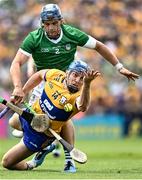 11 June 2023; Shane O'Donnell of Clare is tackled by Michael Casey of Limerick during the Munster GAA Hurling Championship Final match between Clare and Limerick at TUS Gaelic Grounds in Limerick. Photo by Eóin Noonan/Sportsfile