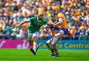 11 June 2023; Tom Morrissey of Limerick in action against David Fitzgerald of Clare during the Munster GAA Hurling Championship Final match between Clare and Limerick at TUS Gaelic Grounds in Limerick. Photo by Daire Brennan/Sportsfile
