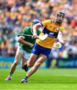 11 June 2023; Cathal Malone of Clare in action against David Reidy of Limerick during the Munster GAA Hurling Championship Final match between Clare and Limerick at TUS Gaelic Grounds in Limerick. Photo by Daire Brennan/Sportsfile