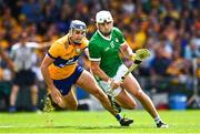11 June 2023; Aaron Gillane of Limerick in action against Cian Nolan of Clare during the Munster GAA Hurling Championship Final match between Clare and Limerick at TUS Gaelic Grounds in Limerick. Photo by Eóin Noonan/Sportsfile