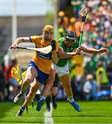 11 June 2023; David Fitzgerald of Clare in action against Gearoid Hegarty of Limerick during the Munster GAA Hurling Championship Final match between Clare and Limerick at TUS Gaelic Grounds in Limerick. Photo by Daire Brennan/Sportsfile