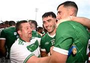 11 June 2023; Aaron Gillane of Limerick, centre, celebrates with teammate Diarmaid Byrnes and a supporter after the Munster GAA Hurling Championship Final match between Clare and Limerick at TUS Gaelic Grounds in Limerick. Photo by Eóin Noonan/Sportsfile